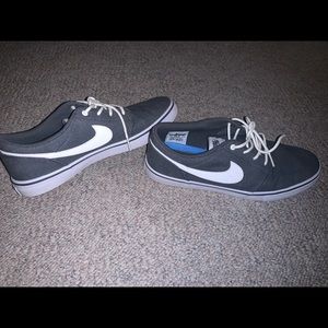 Nike SB gray and white shoes